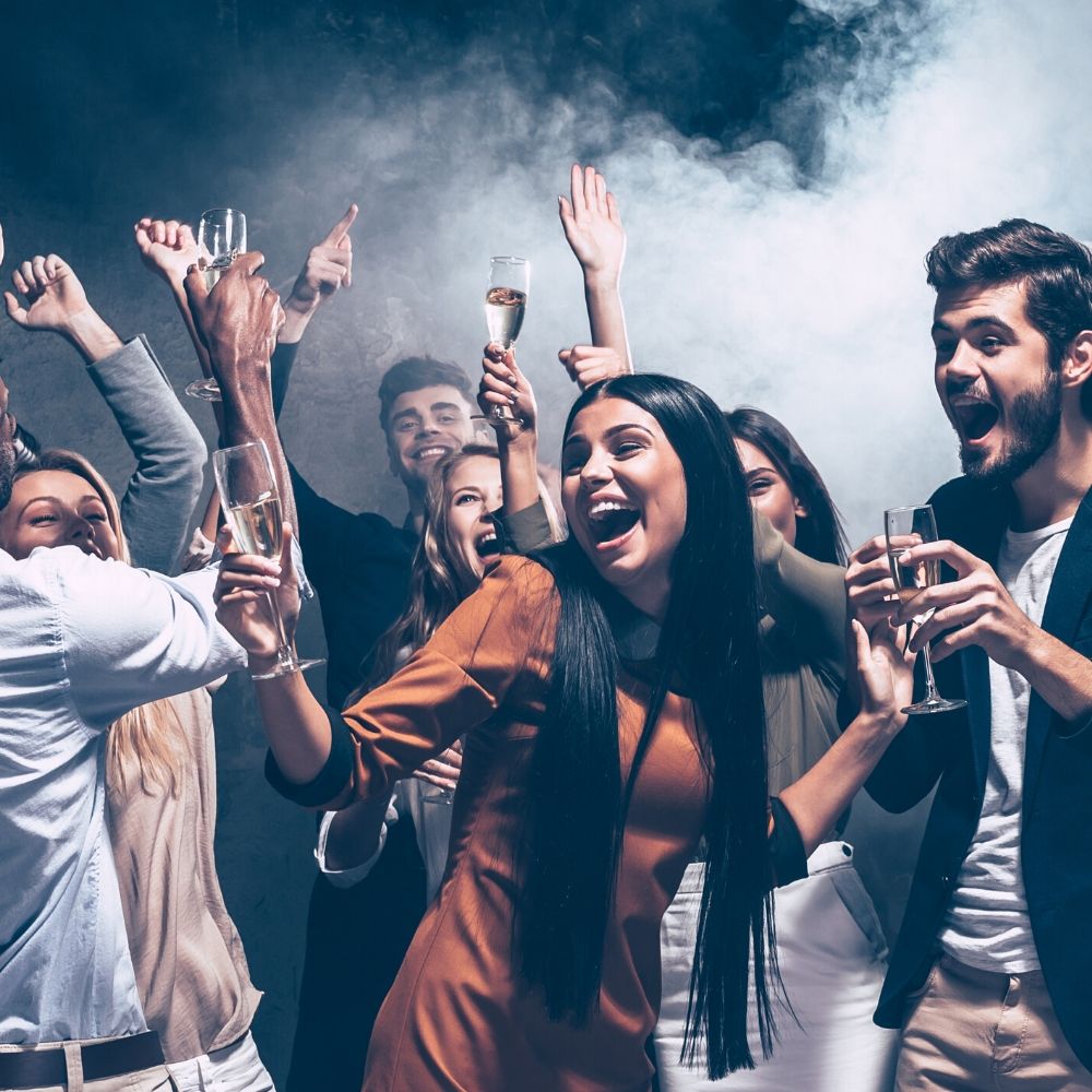 men and women at a party