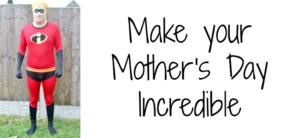 A person in a red superhero costume stands on grass beside a wooden fence. The costume has a black insignia on the chest. Text to the right reads, Make your Mothers Day Incredible.