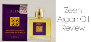 A purple and gold box labeled Zeen sits beside a matching bottle of argan oil, proudly displaying an award sticker. Text on the right reads Zeen Argan Oil: Review. This elegant package from Zeen promises quality and luxury.
