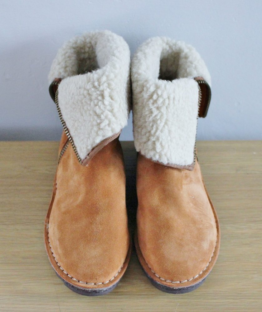CLARKS Olso Beth from Brantano - soft tan suede outer, with a wool lining. Picture shows both books from the front, both boots have the tops turned down to reveal the inner wool lining. This is the style I like best on them.