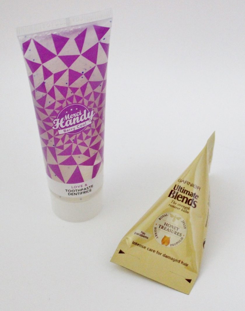 My Little Box January 2017 Merci Handy; Berry Cool toothpaste this is a purple bottle and a triangular sachet of Garnier Ultimate Blends