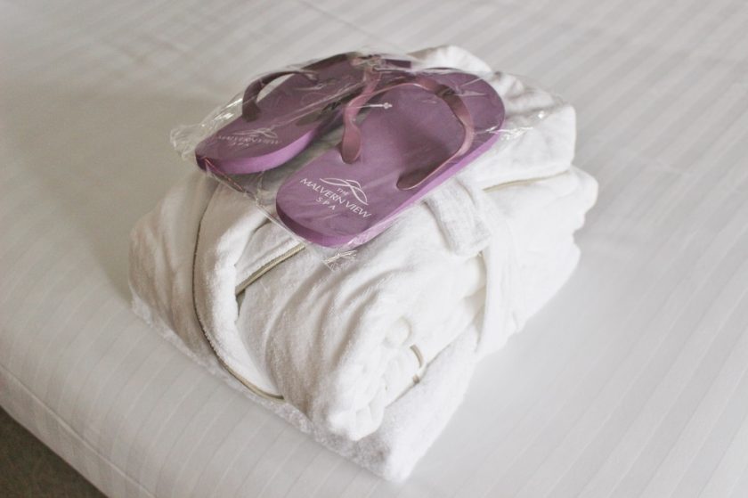 Bank House Hotel & Spa Worcester Towel, Robe and FlipFlops for Spa on Bed