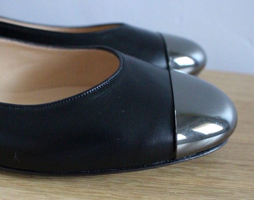 Made in Me Shoes Black Soft Leather Round Toe Ballet Shoes with Silver Leopard Fantasy Heels and Smoked Nickle Toe Plate. Picture Shoes one shoe from the side and one from the front. - Close up of Toe Detail