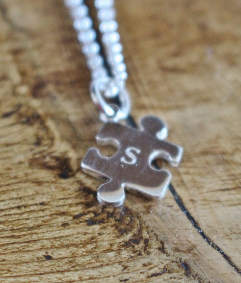 Lily Charmed Engraved Silver Jigsaw Necklace engraved with the letter S