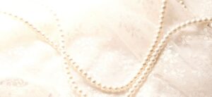 pearl jewellery on lace