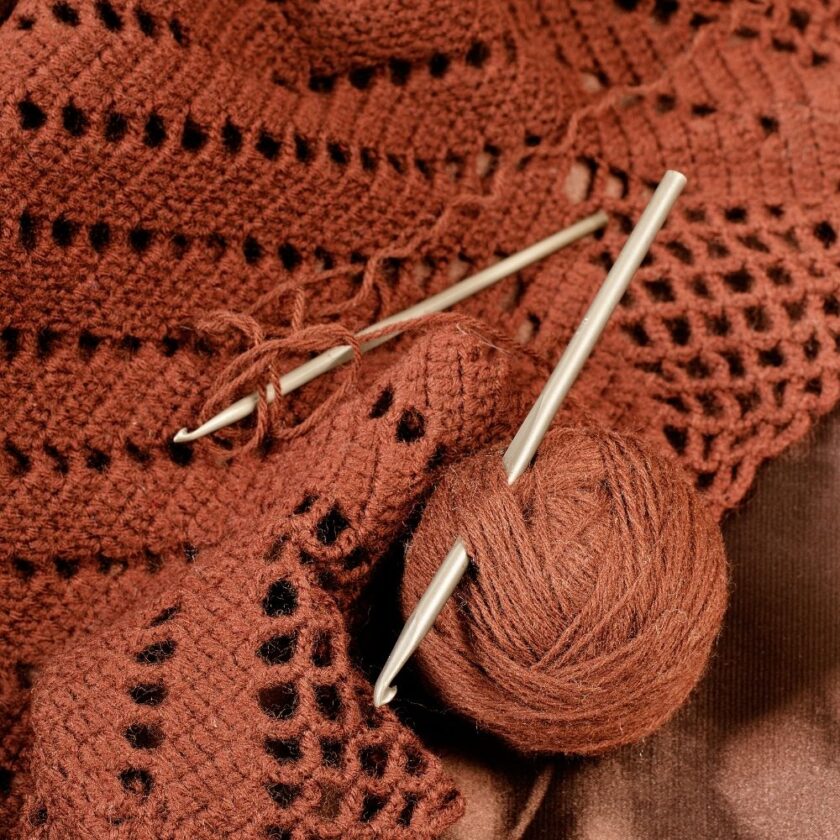 brown yarn being crocheted