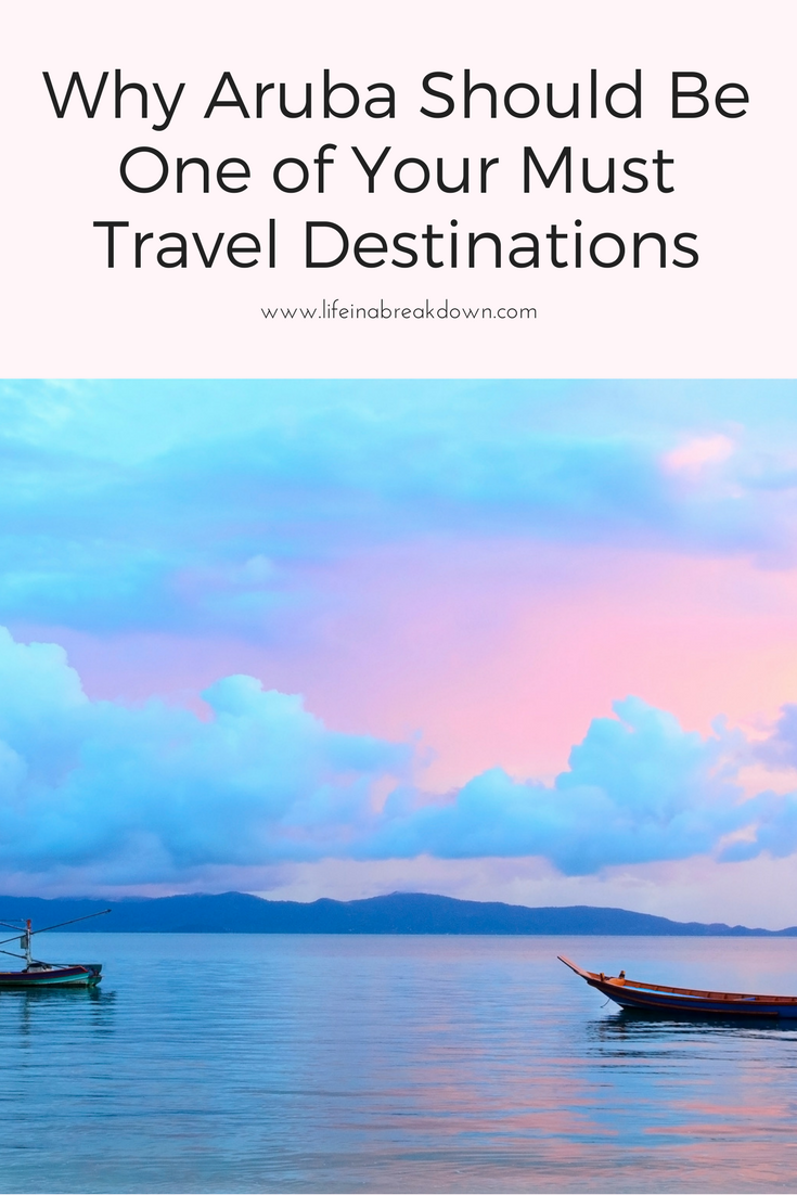 Are you thinking about taking a holiday to Aruba? Then this post is for you as it goes into why it is a must travel destination. #travel #holiday #getaway #aruba