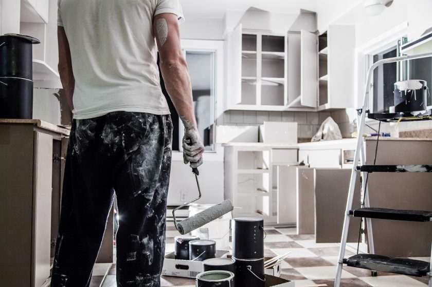 man stood in kitchen which is being renovated