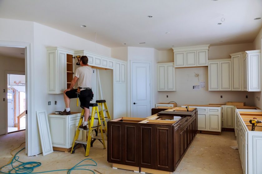 men working in kitchen