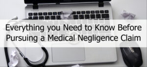 A laptop keyboard with a stethoscope and crumpled papers on it. Text on the image reads: Everything you Need to Know Before Pursuing a Medical Negligence Claim.