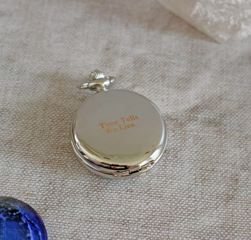 Heritage Dual-Side Pocket Watch from Personally Presented The watch is closed it is engraved with Time Tells No Lies