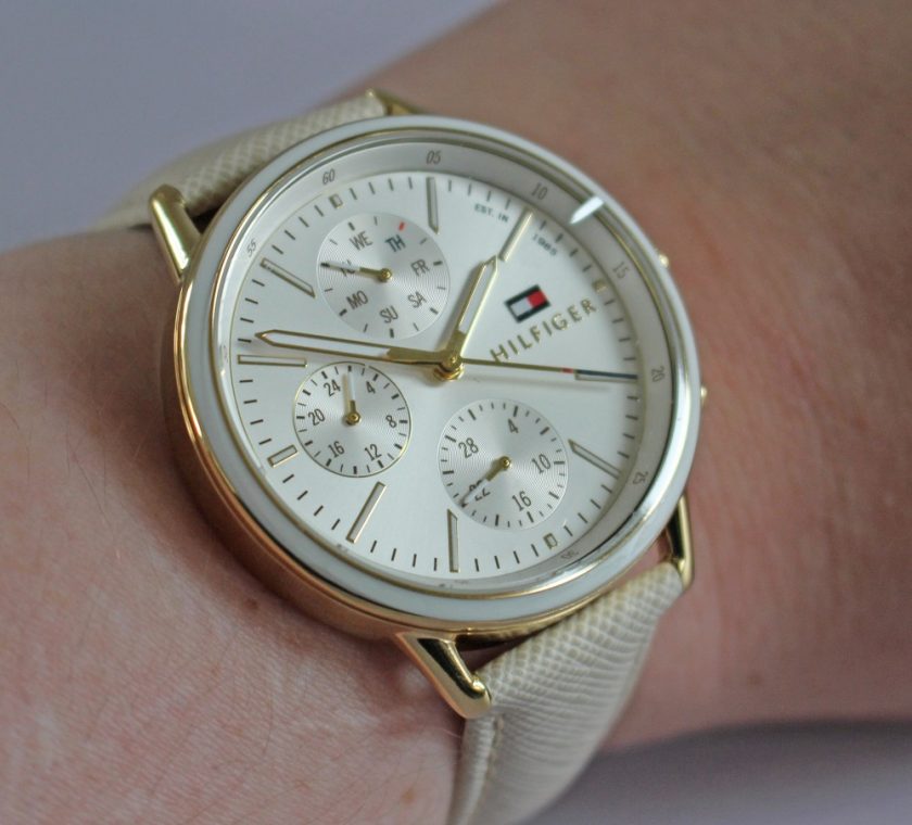 Tommy Hilfiger Womens Carly White Leather Strap White Dial Picture of the watch being worn.