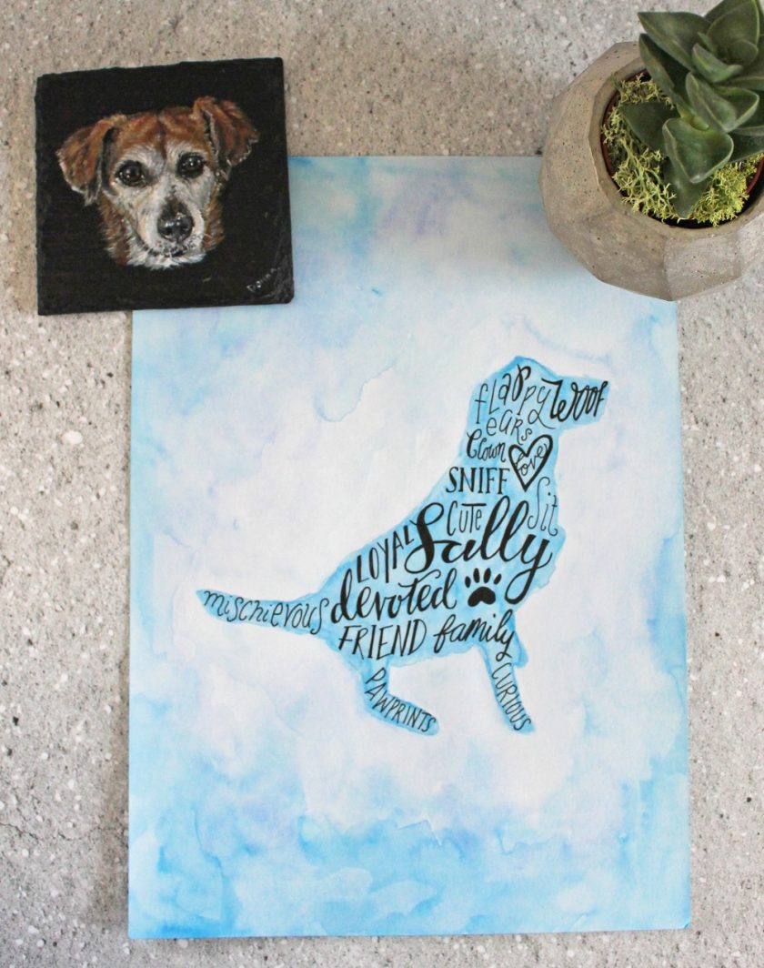 Calligraphy inside a silhouette of Sally Dog using words about her. Image water coloured in blue