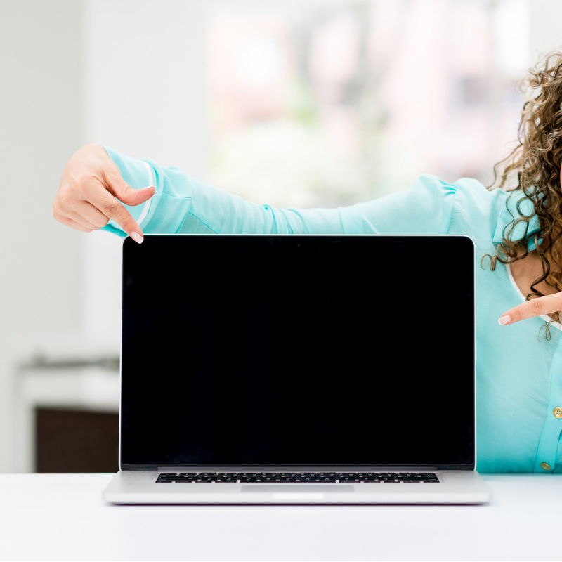 Lady Pointing at a Laptop Screen