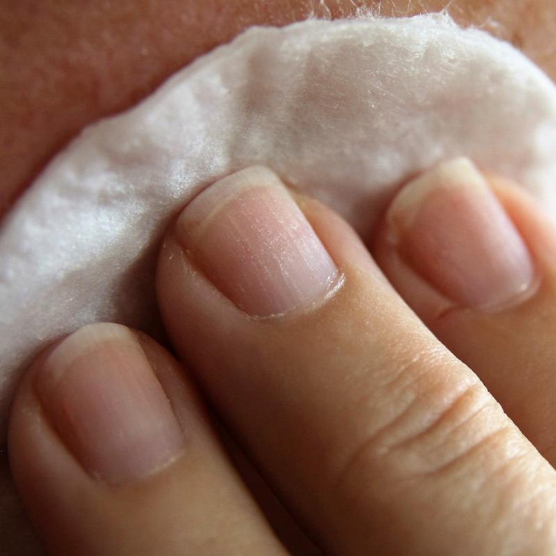 Person Cleansing their skin