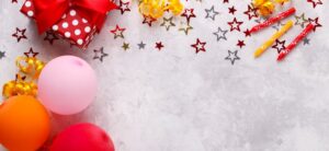 birthday party balloons presents and confetti