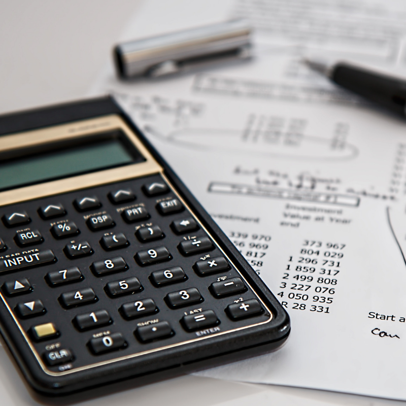 calculator and pens