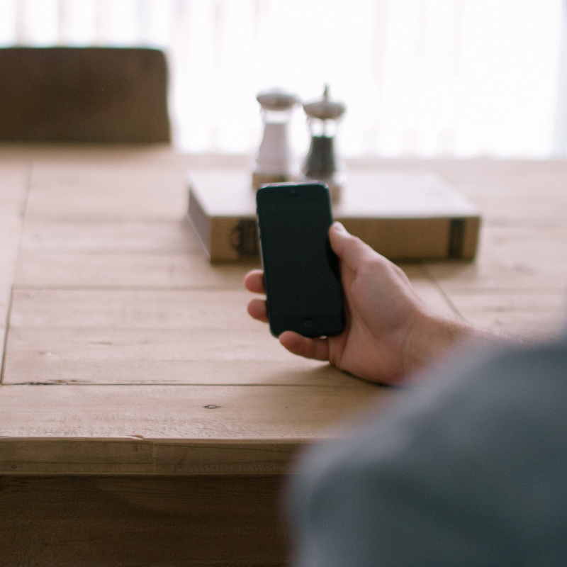 Man Holding a Mobile Phone