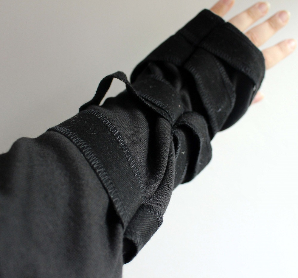 Close up of sleeve Necessary Evil Saturn Mens Ninja Hoody