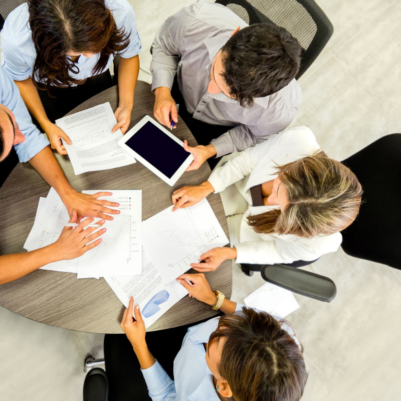 People sat having a meeting in a circle