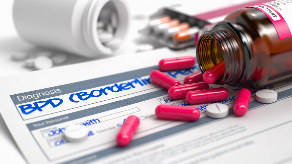 Handwritten Diagnosis Bpd - Borderline Personality Disorder in the Extract From the History of Disease. Medicaments Composition of Heap of Pills, Blister of Pills and Bottle of Tablets. 3D.