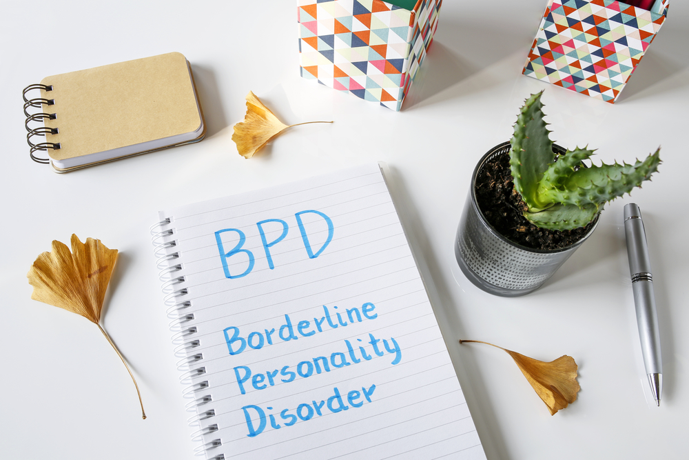 BPD Borderline Personality Disorder written in notebook on white