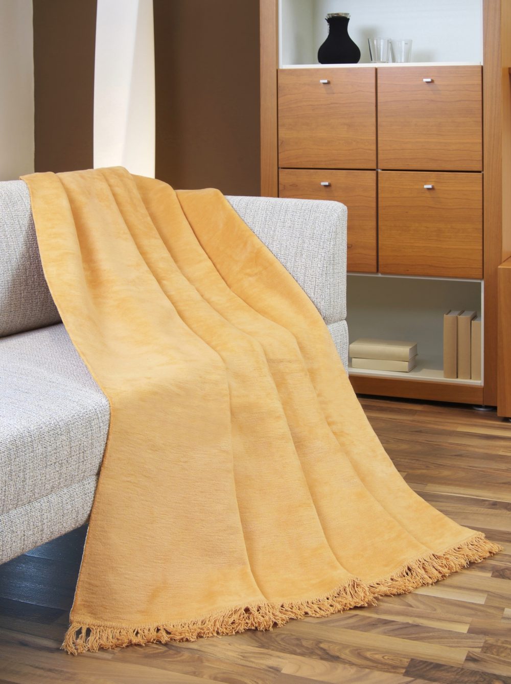 Throw draped over a settee