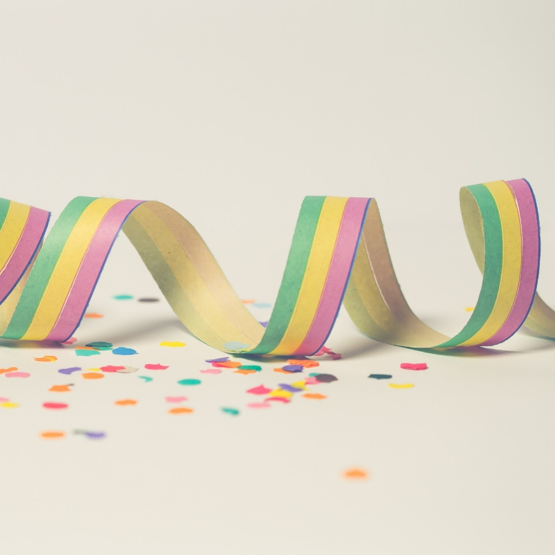 confetti and party decorations on a table