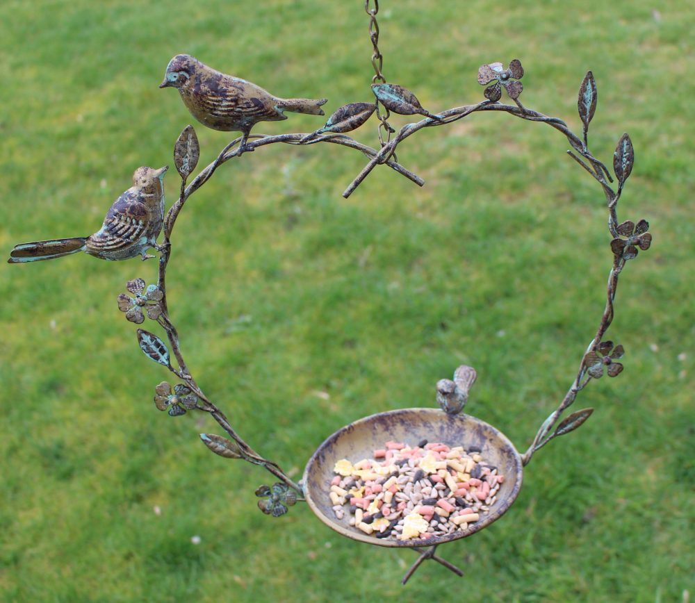 Heart Bird Feeder Gift Set - heart feeder with some of the blend on the dish