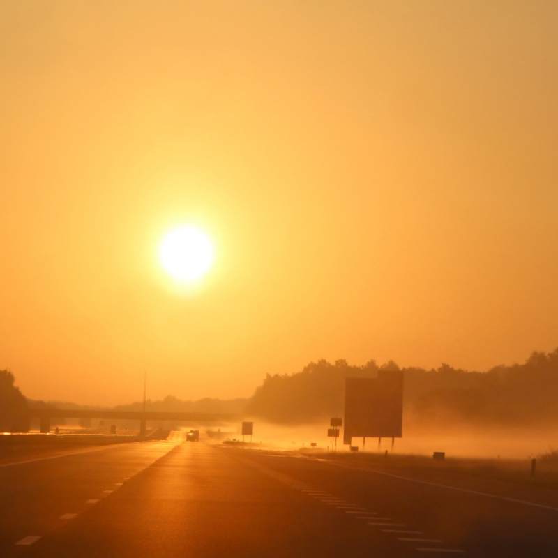 picture of a road at sunset