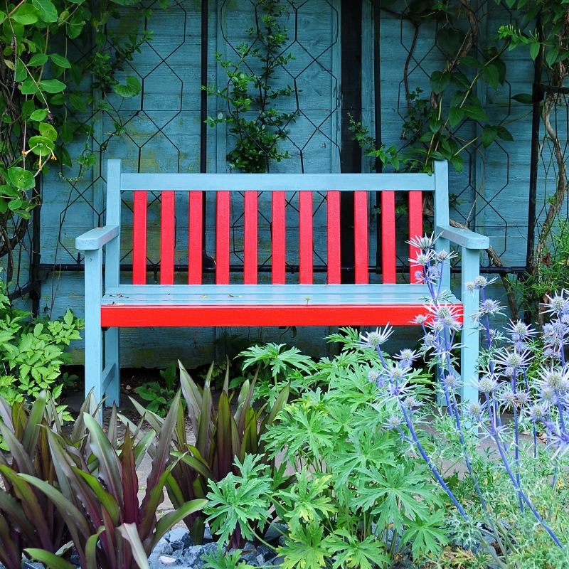 garden bench in red and blue