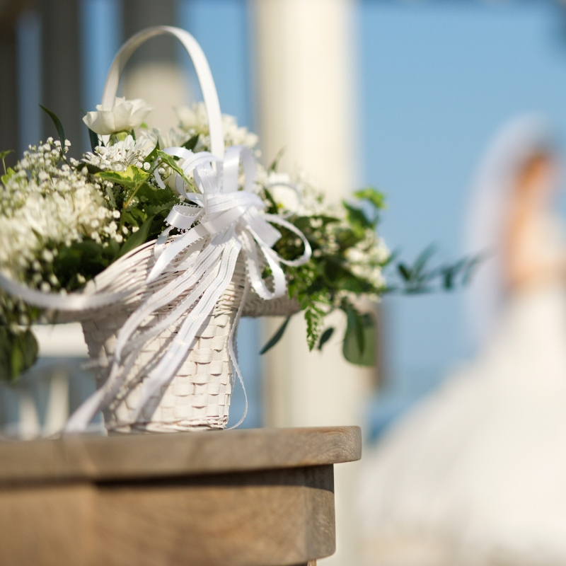 picture of flowers with a bride in the background