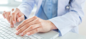 picture of someones hands on a keyboard