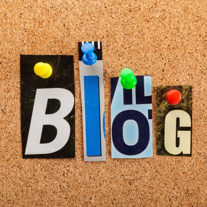 the word blog on a pin board