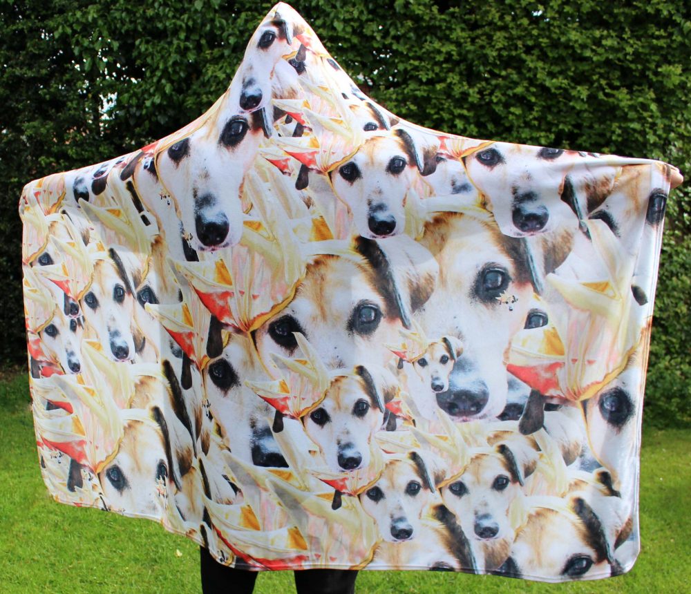 Your Faces, face hooded towel with Sally dog on it in her golden crown viewed from the side slightly.
