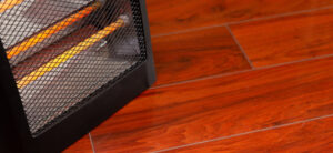 picture of a heater stood on a wooden floor
