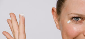 picture of someone applying eye cream