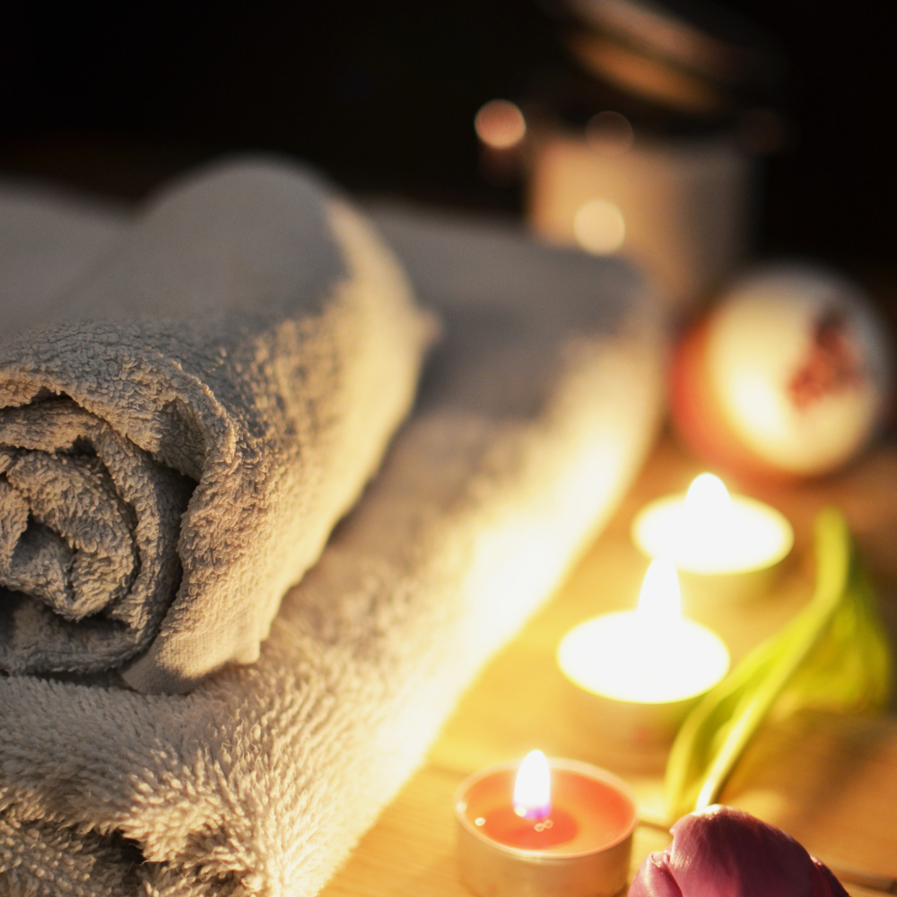 towels and candles for a bath