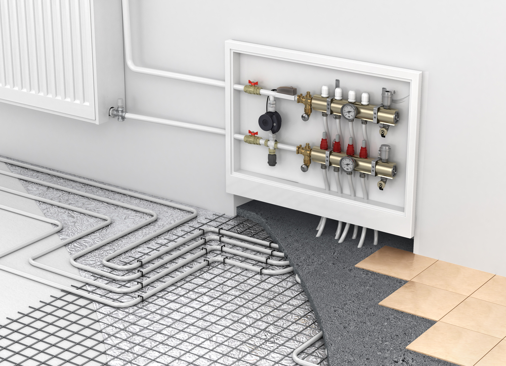 Underfloor heating with collector and radiator in the room. Concept of technology heating. The order of layers in the floor.
