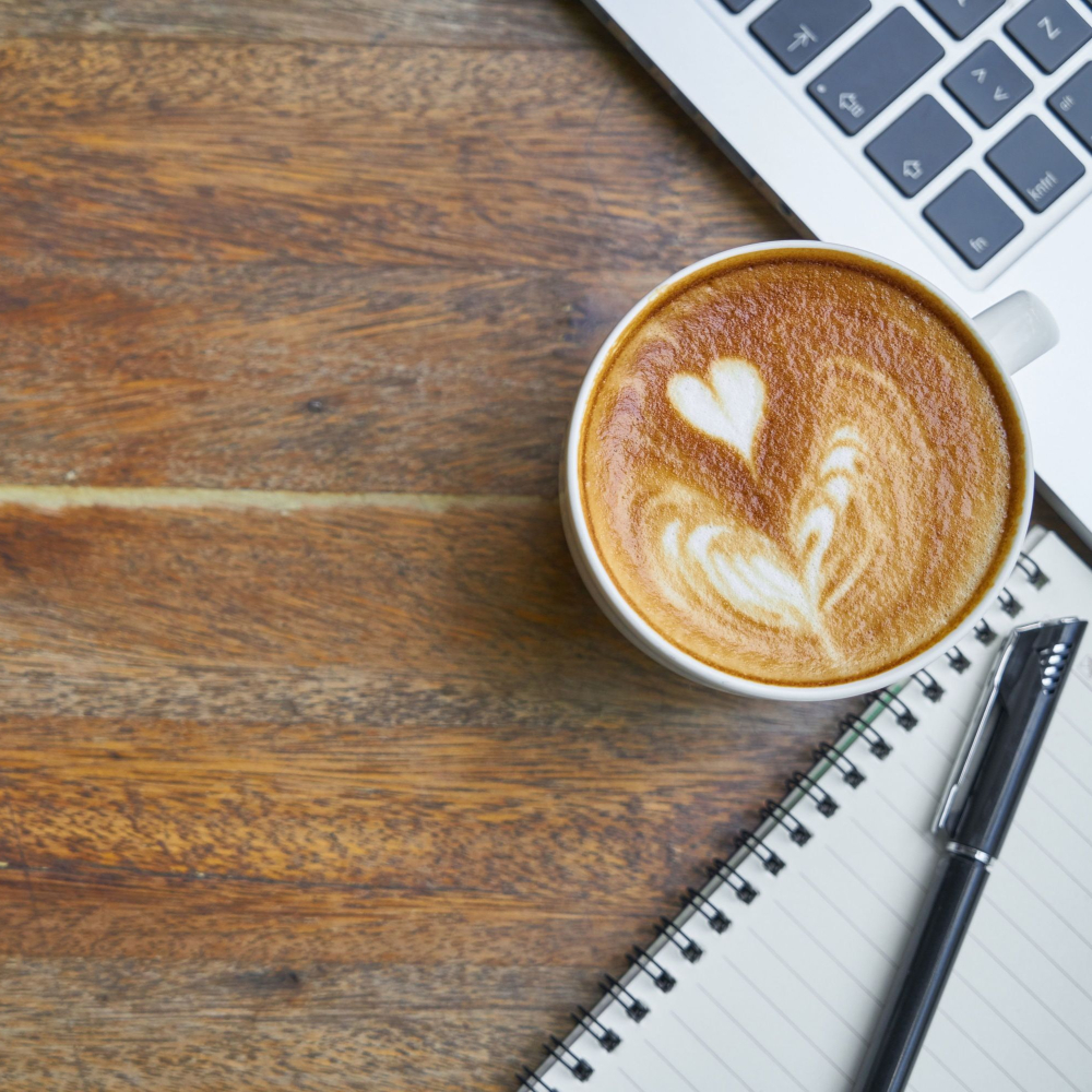 coffee, laptop and notepad