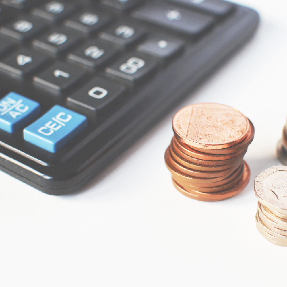 calculator and coins