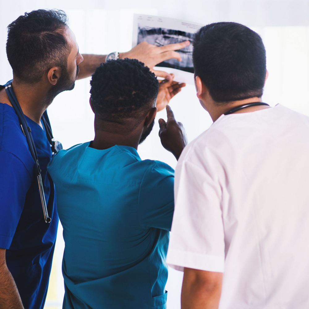 dentists looking at an xray