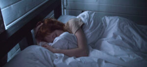 Women asleep in bed