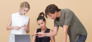Workers at a computer