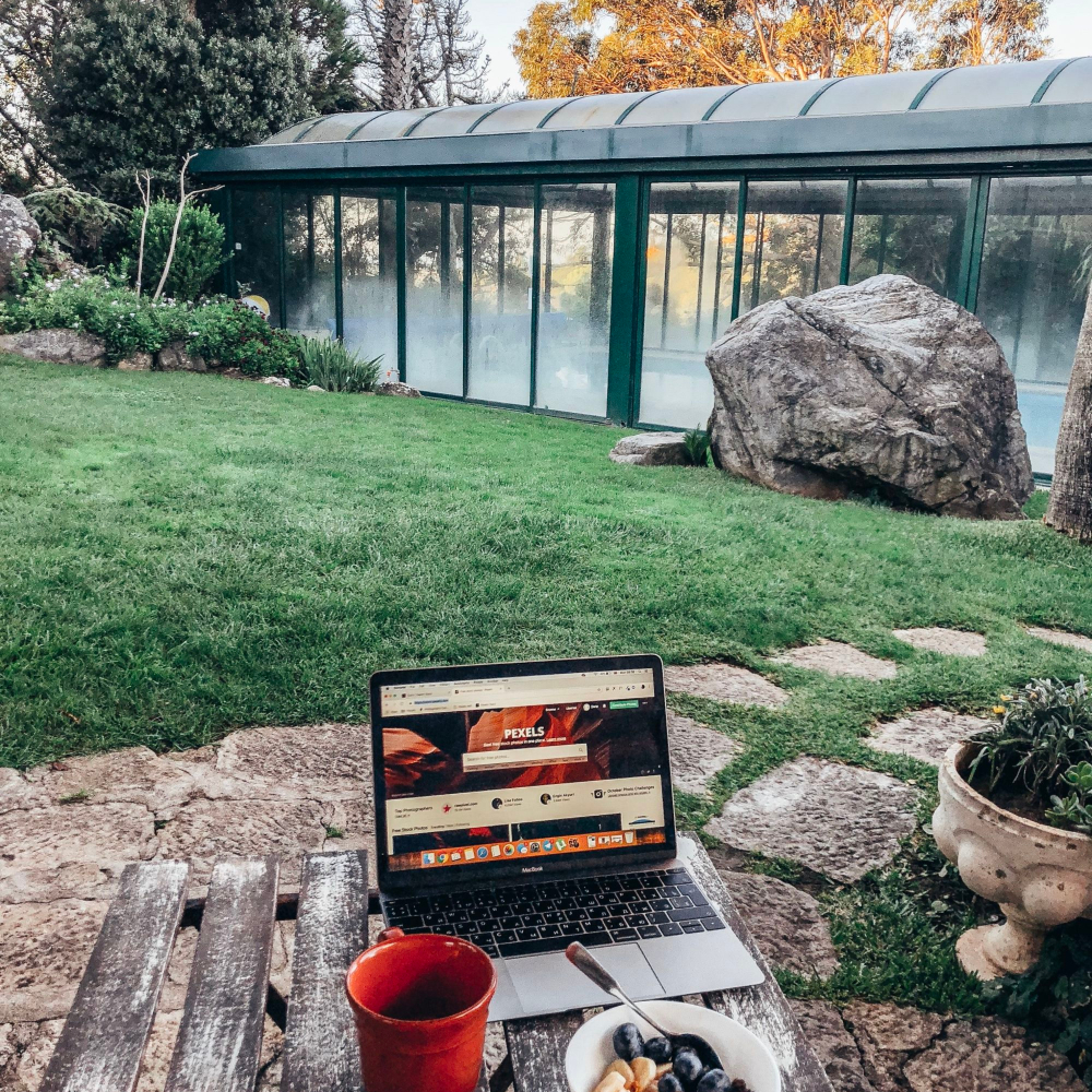 computer and breakfast outside
