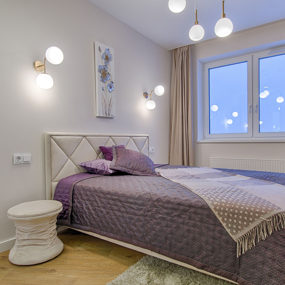 bedroom with bed under windows