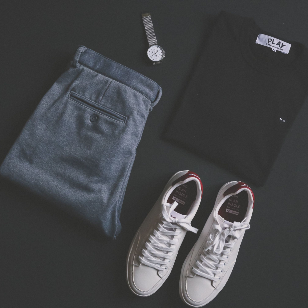 outfit including jeans and trainers