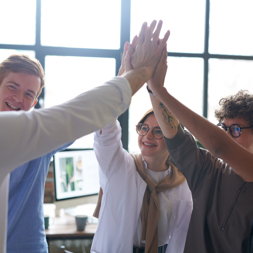 people with their hands together