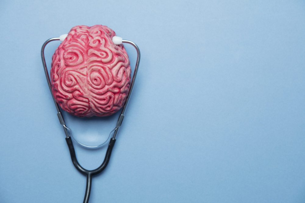 Mental health concept. human brain on a blue background