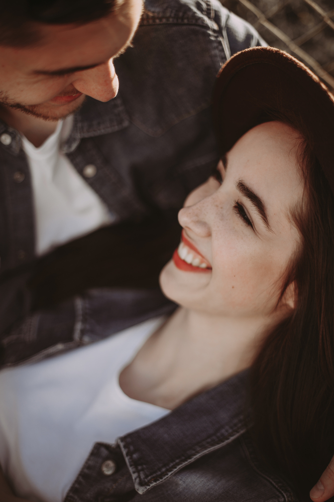 female and male looking at each other and smiling